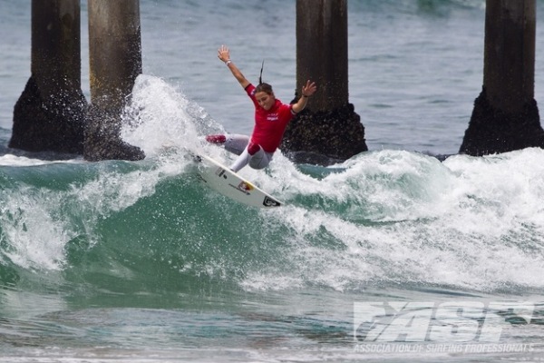 Sally Fitzgibbons (AUS) signs with Firewire surfboards.