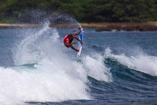 Jadson Andre advancing with his signature air-reverse at the Reef Hawaiian Pro.
