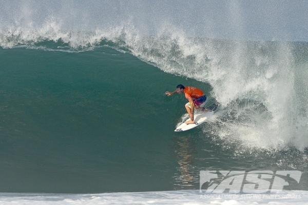 Joel Parkinson (AUS), 32, reigning ASP World Champion, driving through a freight train Keramas barrel during Round 3 of the Oakley Pro Bali.