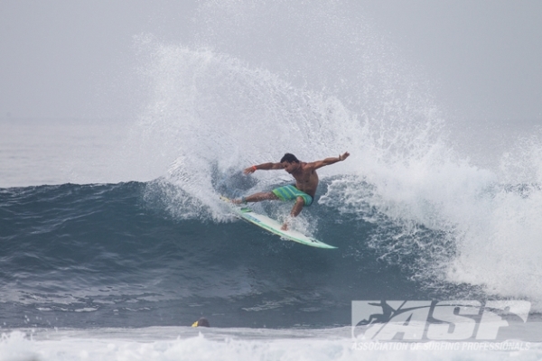 Michel Bourez (PYF), 27, warms up at Keramas. "The Spartan" will take on Gabriel Medina (BRA), 19, in Round 3 of the Oakley Pro Bali.