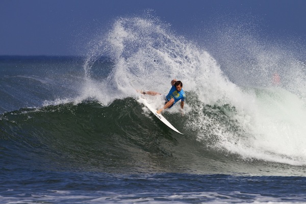 ASP Top 34 member Brett Simpson gouging at Haleiwa, the first stop at the Vans Triple Crown.