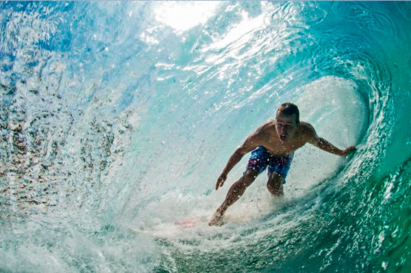 Todd Kline takes quick surf-break in between commentating heats in Hawaii. - ASP / Picasa
