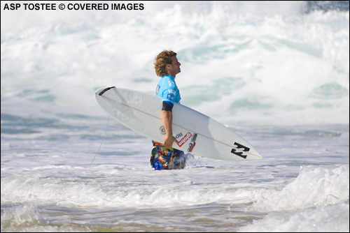 Mark Occhilupo Heads Out For His Round 1 Heat at The Billabong Pipeline Masters. Surf Photo Credit ASP Tostee