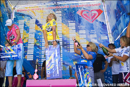 Jennifer Smith is showered in champagne after being crowned as the new Roxy ASP Womens World Longboard Champion.