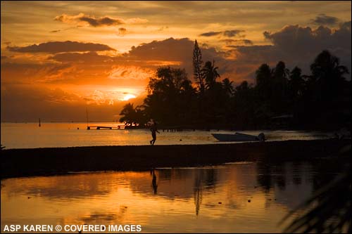 Tahitian Sunset, Teahupoo Tahiti.  Pic Credit ASP Tostee