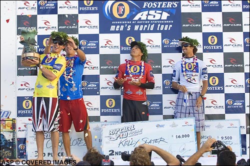 Hawaiian Andy Irons celebrates his victory at the prize giving with Cory Lopez (3rd), Kelly Slater (2nd) and Rob Machado (4th). Pic Credit ASP Tostee