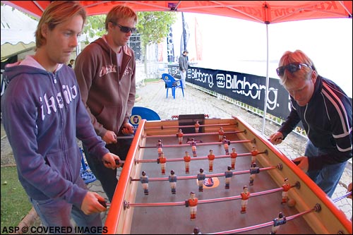Whether its a heat or a game of Fuse Ball, pro-surfers never let up on their competitive edge. South Africans Davey Weare, Greg Emslie & Travis Logie taking their down time somewhat seriously. Picture credit ASP Tostee